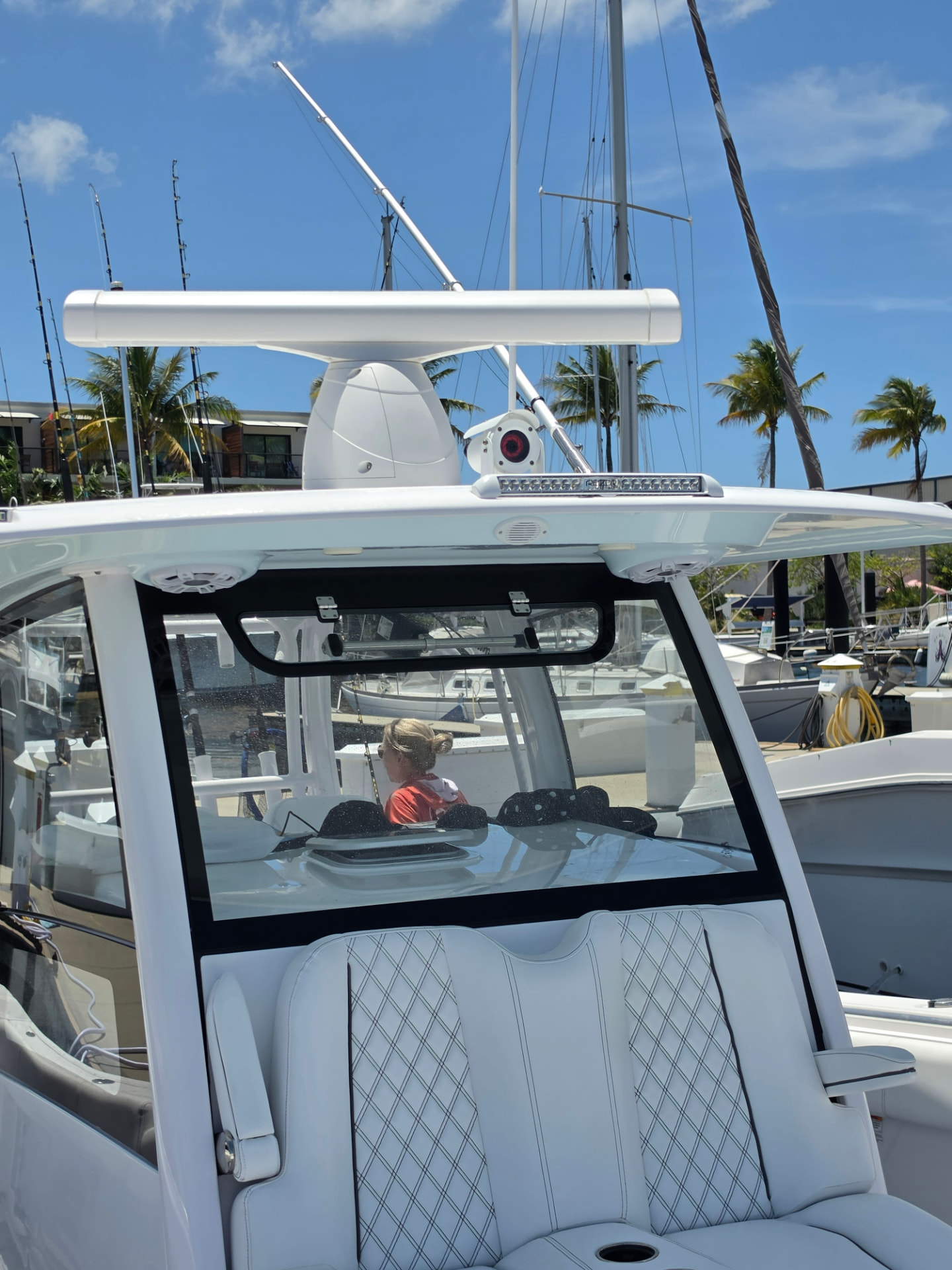 Camera installed on a boat hardtop next to radar