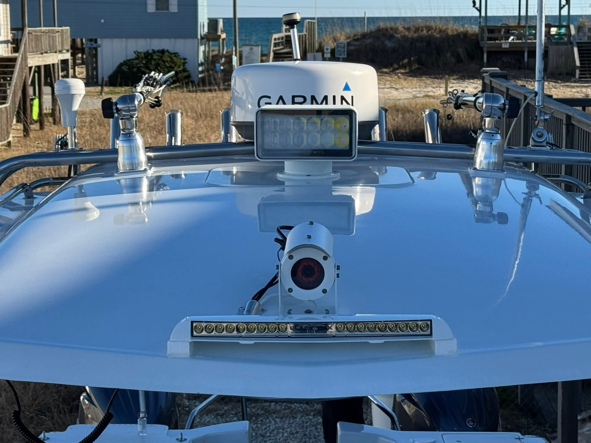 Center console hardtop mount beside a Garmin radar dome